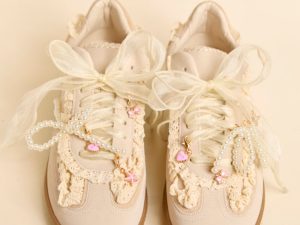 April Cream Shoe Charm Sneakers