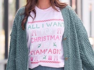 All I Want For Christmas Is Champagne Light Pink Graphic Tee